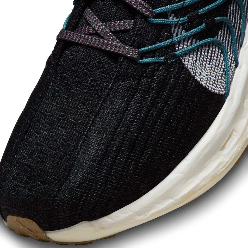 Left shoe toebox view of Nike Women's Pegasus Turbo Flyknit Next Nature Running Shoes in black. (7750553796770)