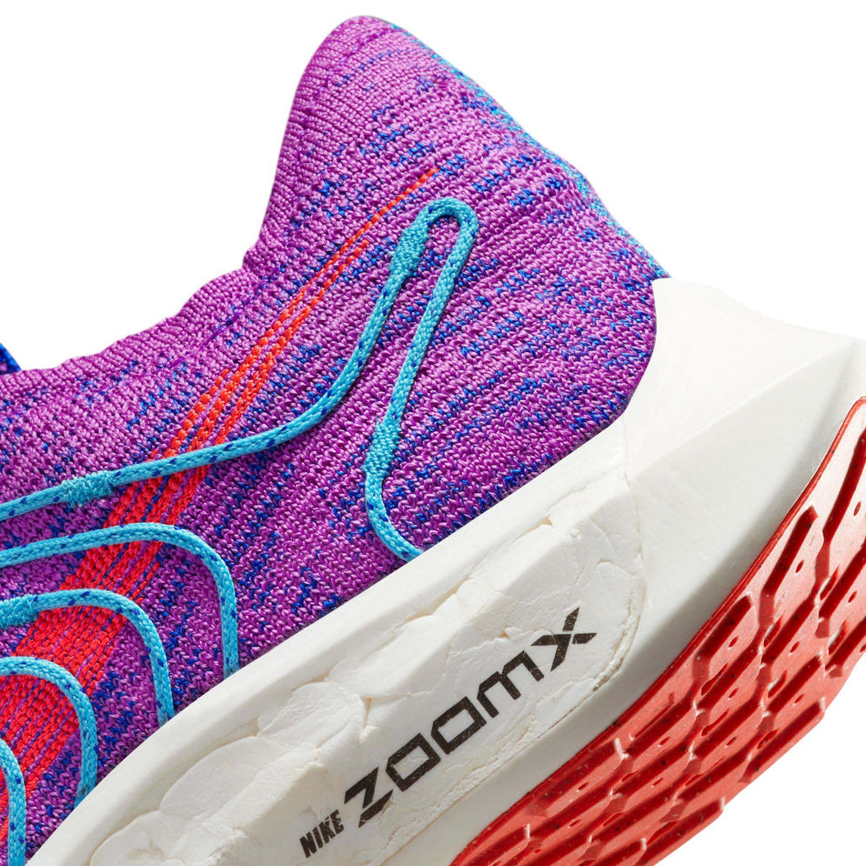 The lateral side of the heel unit on the left shoe from a pair of women's Nike Pegasus Turbo Flyknit Next Nature Running Shoes (7728708124834)