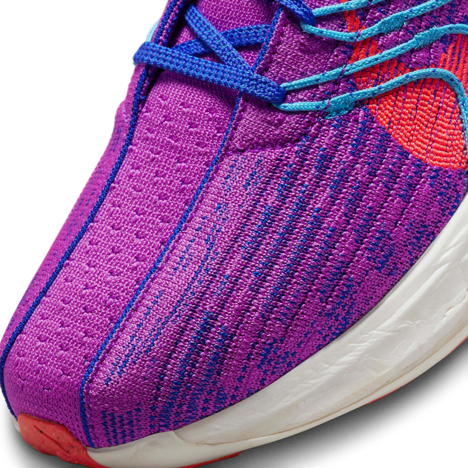 The toe box on the left shoe from a pair of women's Nike Pegasus Turbo Flyknit Next Nature Running Shoes (7728708124834)