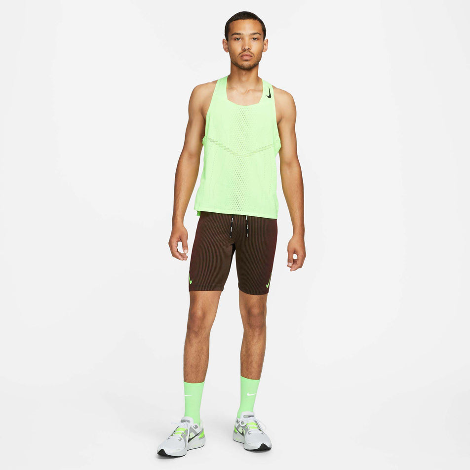 Outfit model view of men's Nike Aeroswift Half Tights in brown (7492237263010)
