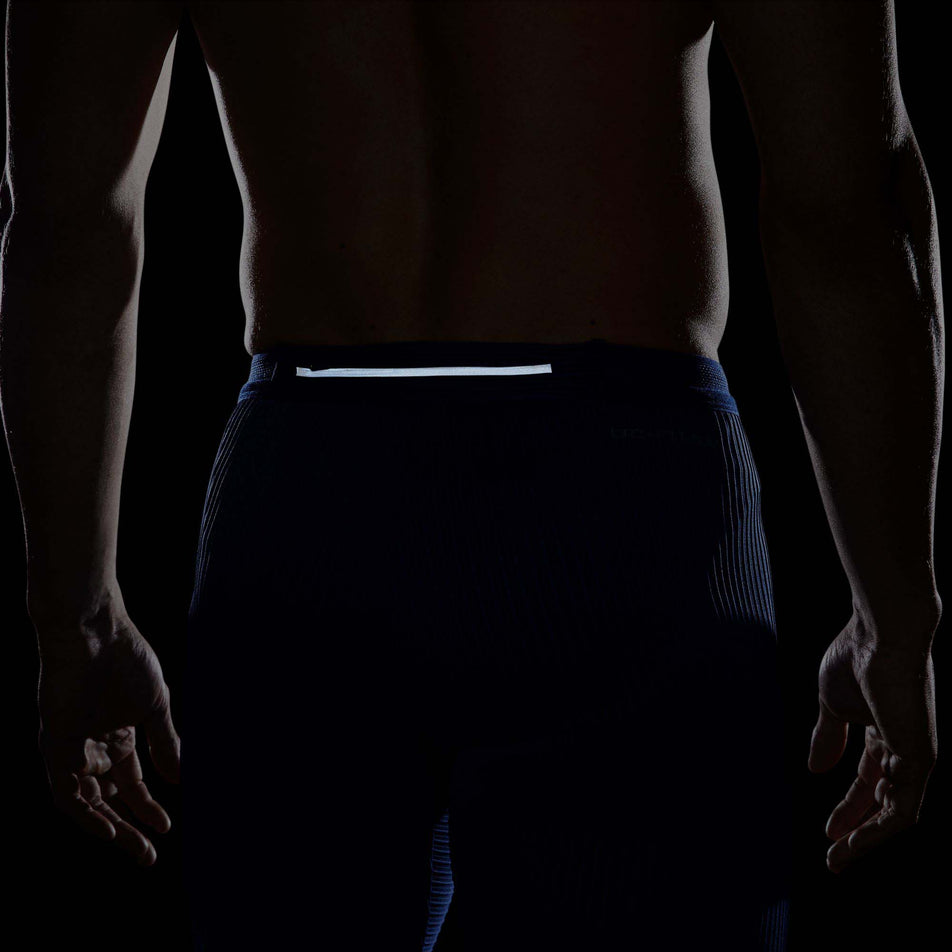 Reflective view of men's nike df adv aroswft half tight (7388138307746)