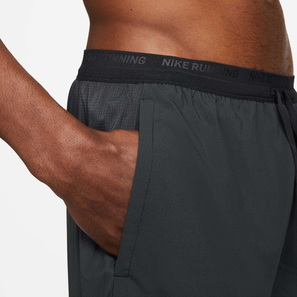 Side pocket view of men's nike df stride short 5in bf (7386151223458)