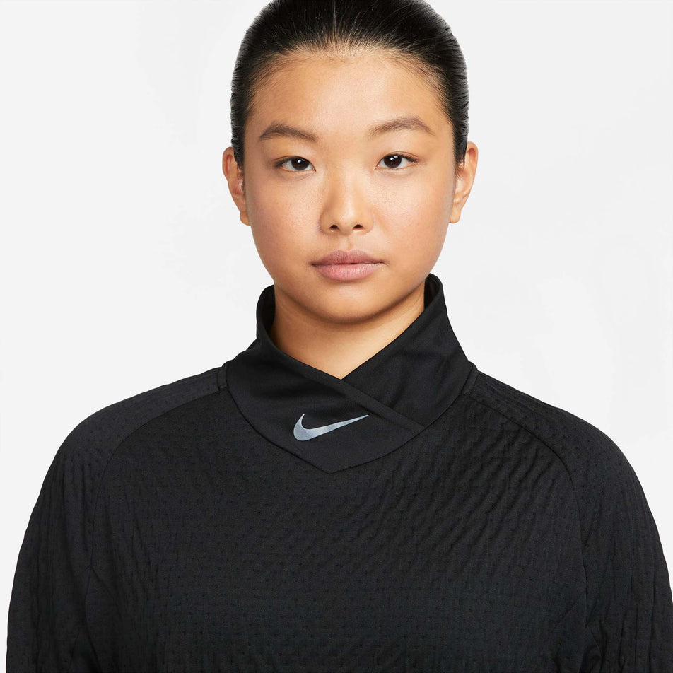 Collar view of women's nike tf run division midlayer (7328903954594)