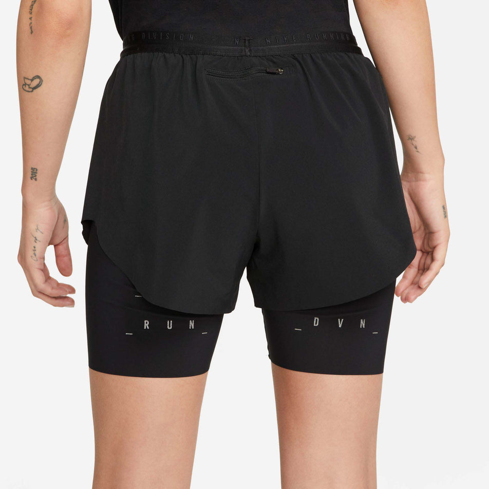 Behind view of women's nike df run dvn 2in1 short (7386193395874)