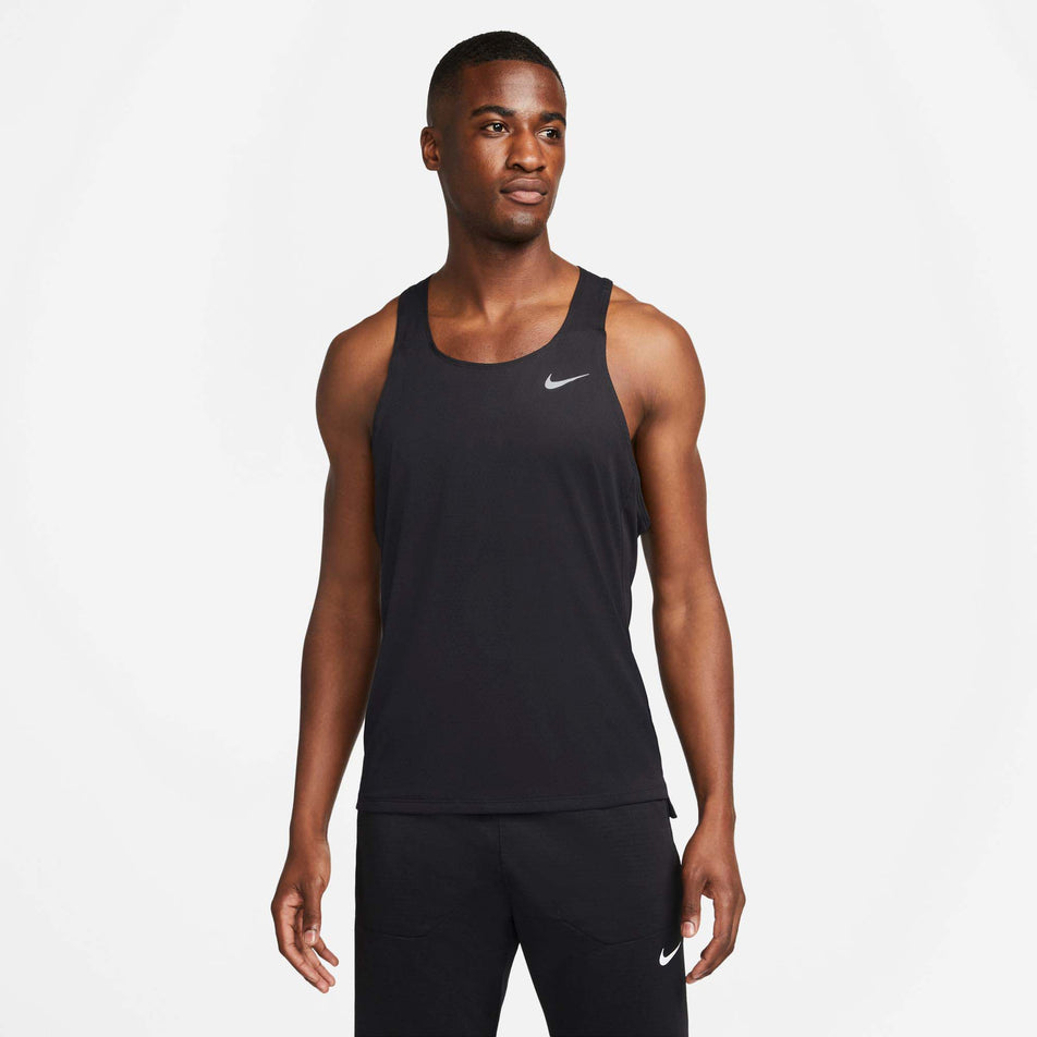 Front view of a model wearing a Nike Men's Dri-FIT Fast Racing Singlet (7876622614690)