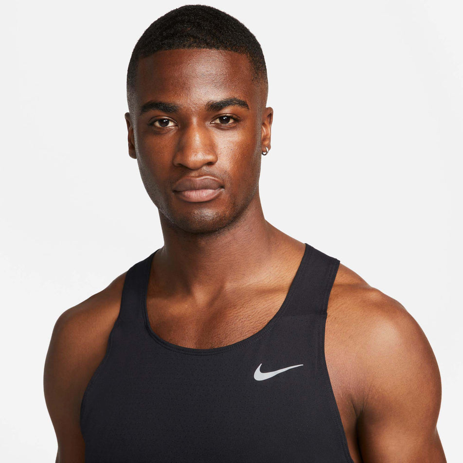 Close-up upper front view of a model wearing a Nike Men's Dri-FIT Fast Racing Singlet (7876622614690)