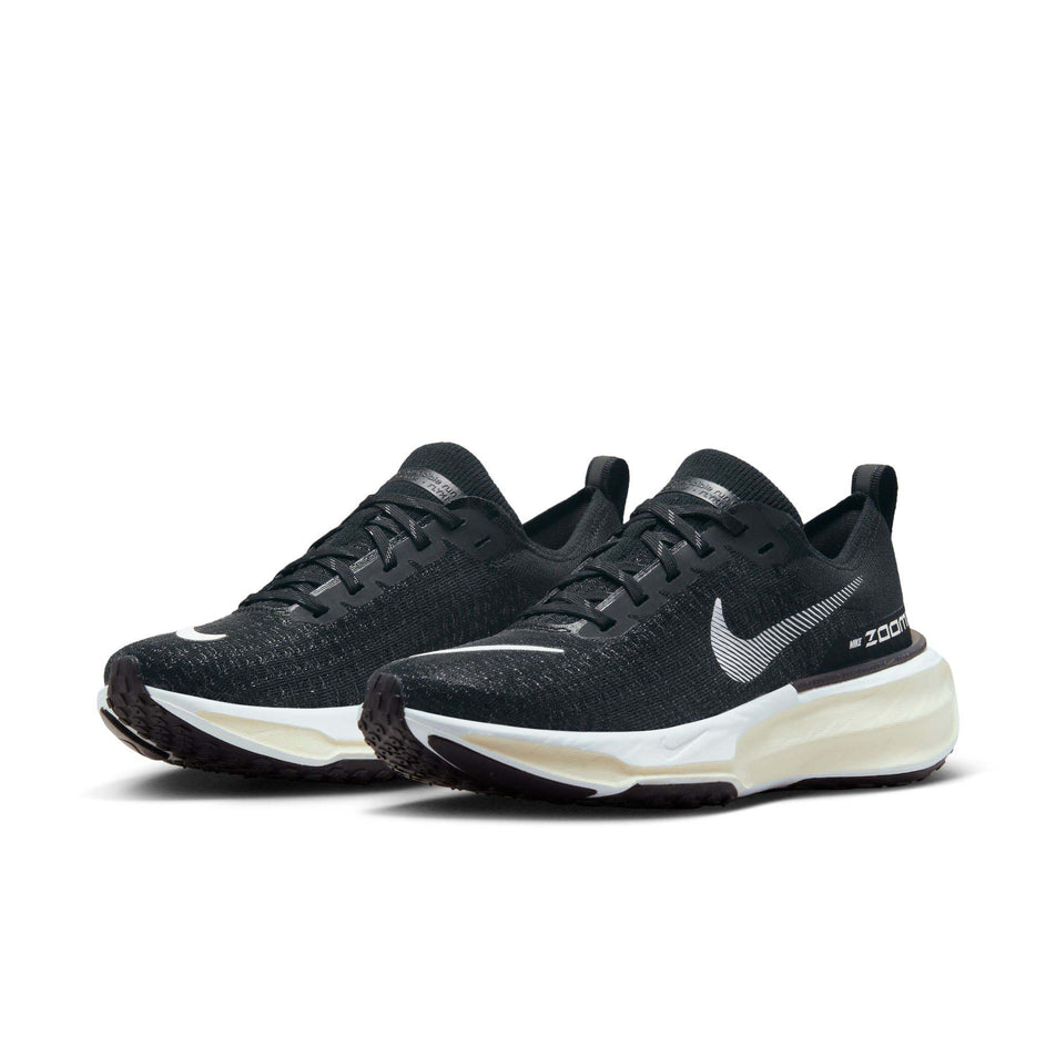 Pair anterior angled view of Nike Women's ZoomX Invincible Run Flyknit 3 Running Shoes in black. (7751499743394)