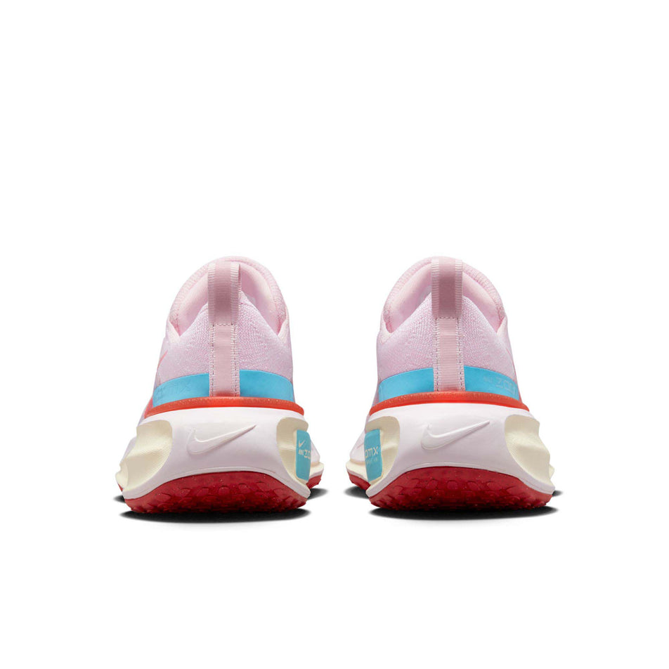 Pair posterior view of Nike Women's ZoomX Invincible Run Flyknit 3 Running Shoes in pink. (7751504953506)
