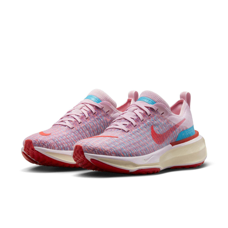 Pair anterior angled view of Nike Women's ZoomX Invincible Run Flyknit 3 Running Shoes in pink. (7751504953506)