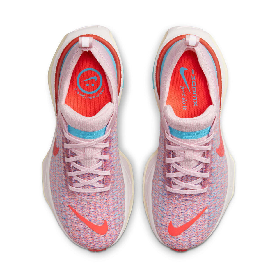 Pair upper view of Nike Women's ZoomX Invincible Run Flyknit 3 Running Shoes in pink. (7751504953506)
