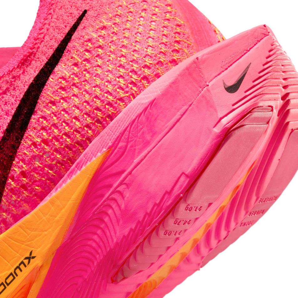Lateral side of the heel on the left shoe from a pair of Nike Men's Vaporfly 3 Road Racing Shoes in the Hyper Pink/Black-Laser Orange colourway  (7867146961058)