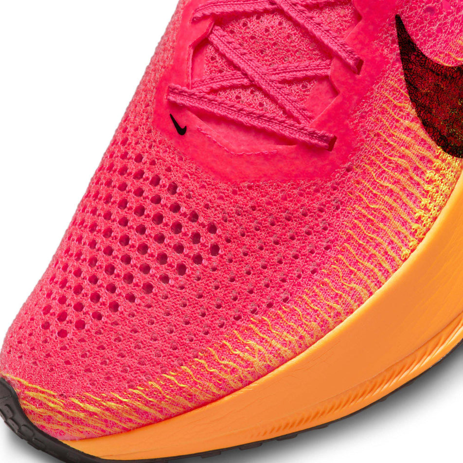 The toe box on the left shoe from a pair of Nike Men's Vaporfly 3 Road Racing Shoes in the Hyper Pink/Black-Laser Orange colourway  (7867146961058)