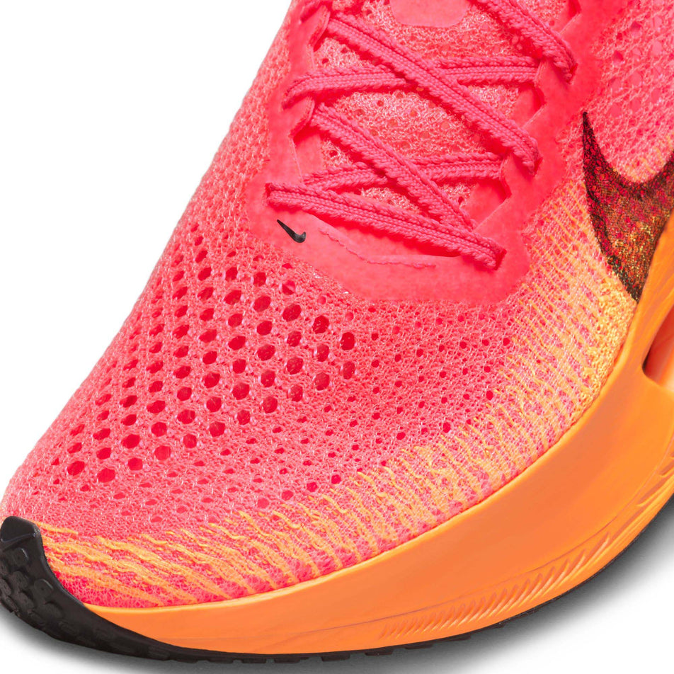 The toe box on the left shoe from a pair of Nike Women's Vaporfly 3 Road Racing Shoes in the Hyper Pink/Black-Laser Orange colourway (7867373584546)