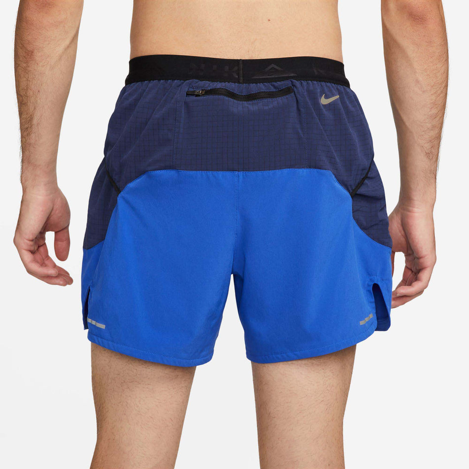 Rear view of Nike Men's DF Trail Running Short 5 Inch in blue. (7729616945314)