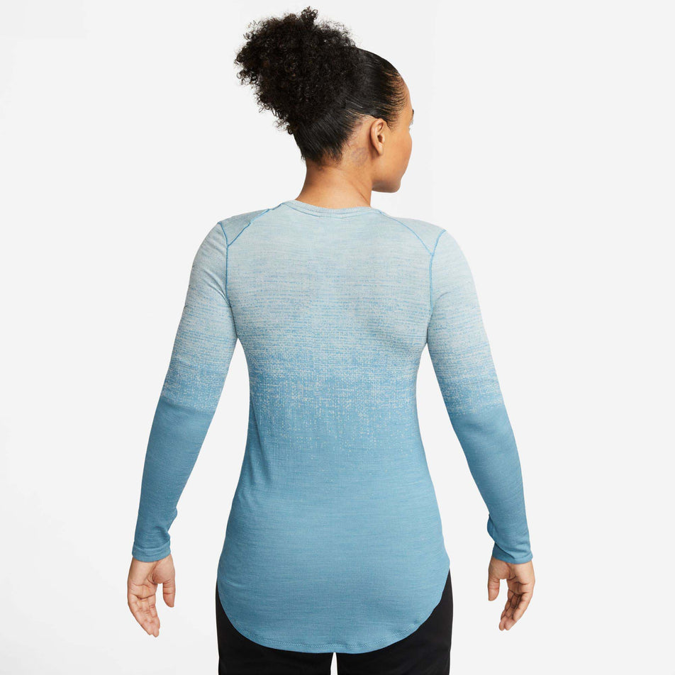 Back view of a model wearing a Nike women's Dri-FIT ADV Run Division Long-Sleeve Running Top (7729601249442)