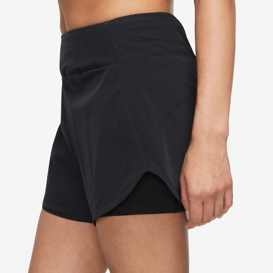 Side view of Nike Women's Bliss DF MR 3 Inch 2in1 Running Short in black. (7761806360738)