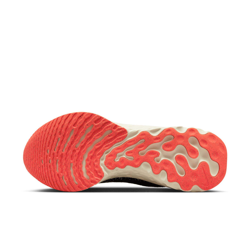 The outsole of the left shoe from a pair of Nike Men's React Infinity 3 Road Running Shoes (7864285560994)