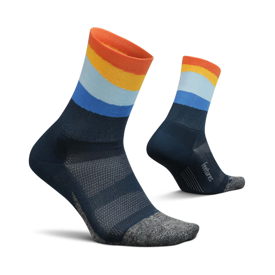 A pair of Feetures Unisex Elite Light Cushion Mini Crew Running Socks in blue.(7757393166498)