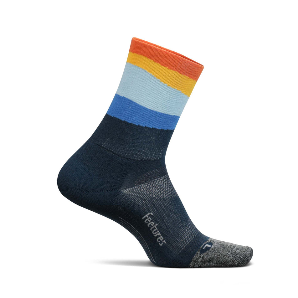 Medial view of the left sock from a pair of Feetures Unisex Elite Light Cushion Mini Crew Running Socks in blue. (7757393166498)