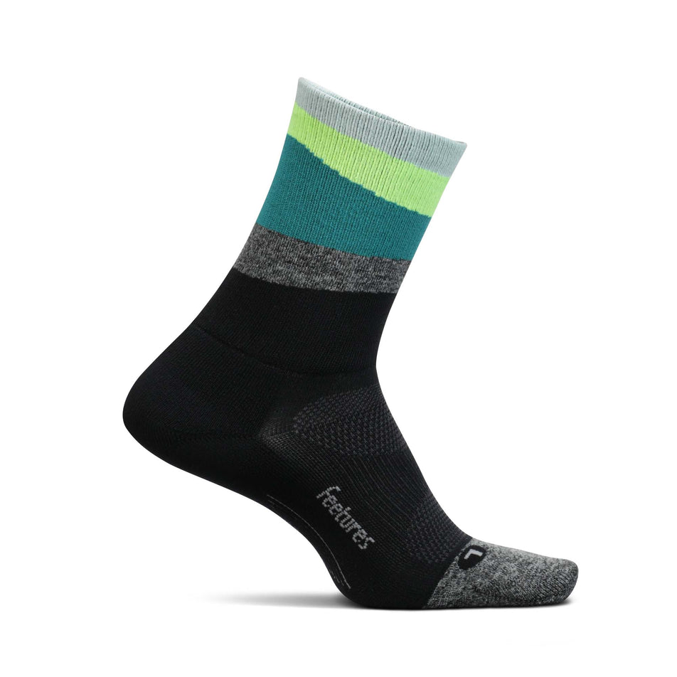Medial view of the left sock from a pair of Feetures Unisex Elite Light Cushion Mini Crew Running Socks in green. (7757397164194)