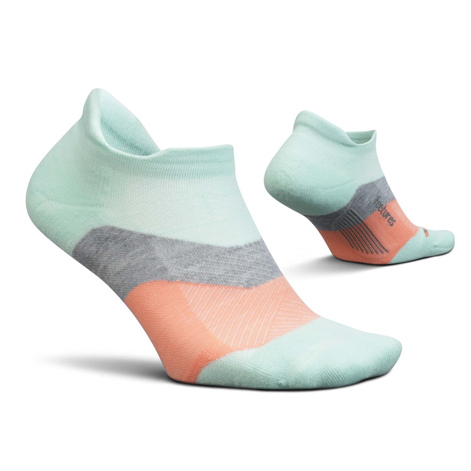 A pair of Feetures Unisex Elite Max Cushion No Show Tab in green. (7758521172130)