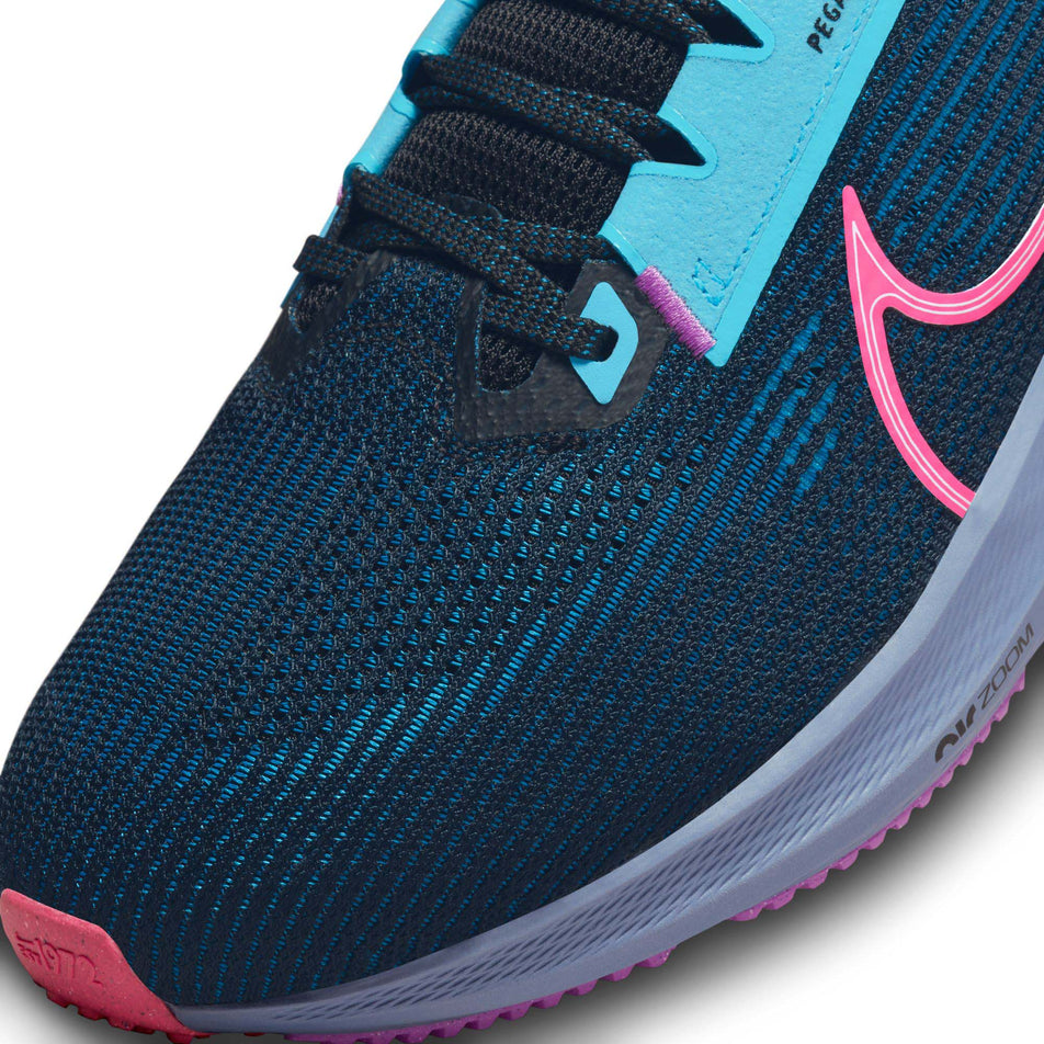 The toe box of the left shoe from a pair of men's Nike Air Zoom Pegasus 40 SE Road Running Shoes (7846184779938)