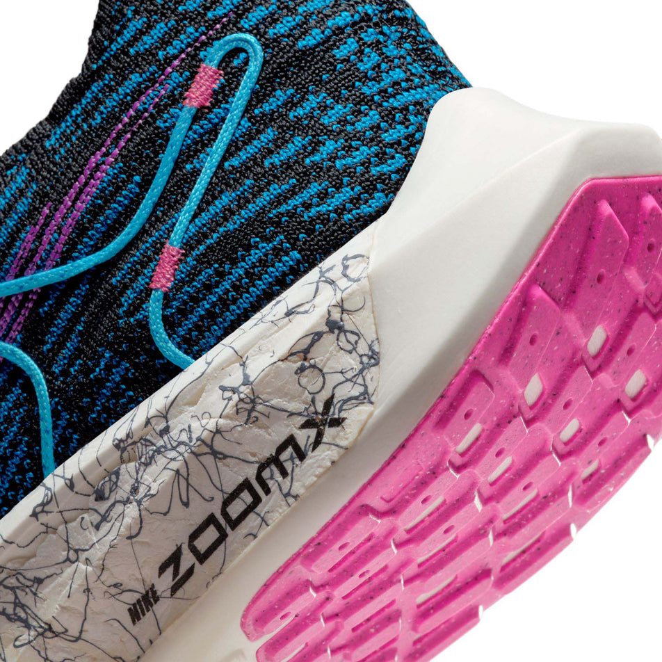 Lateral side of the heel counter on the left shoe from a pair of men's Nike Pegasus Turbo Next Nature SE Road Running Shoes (7864276353186)