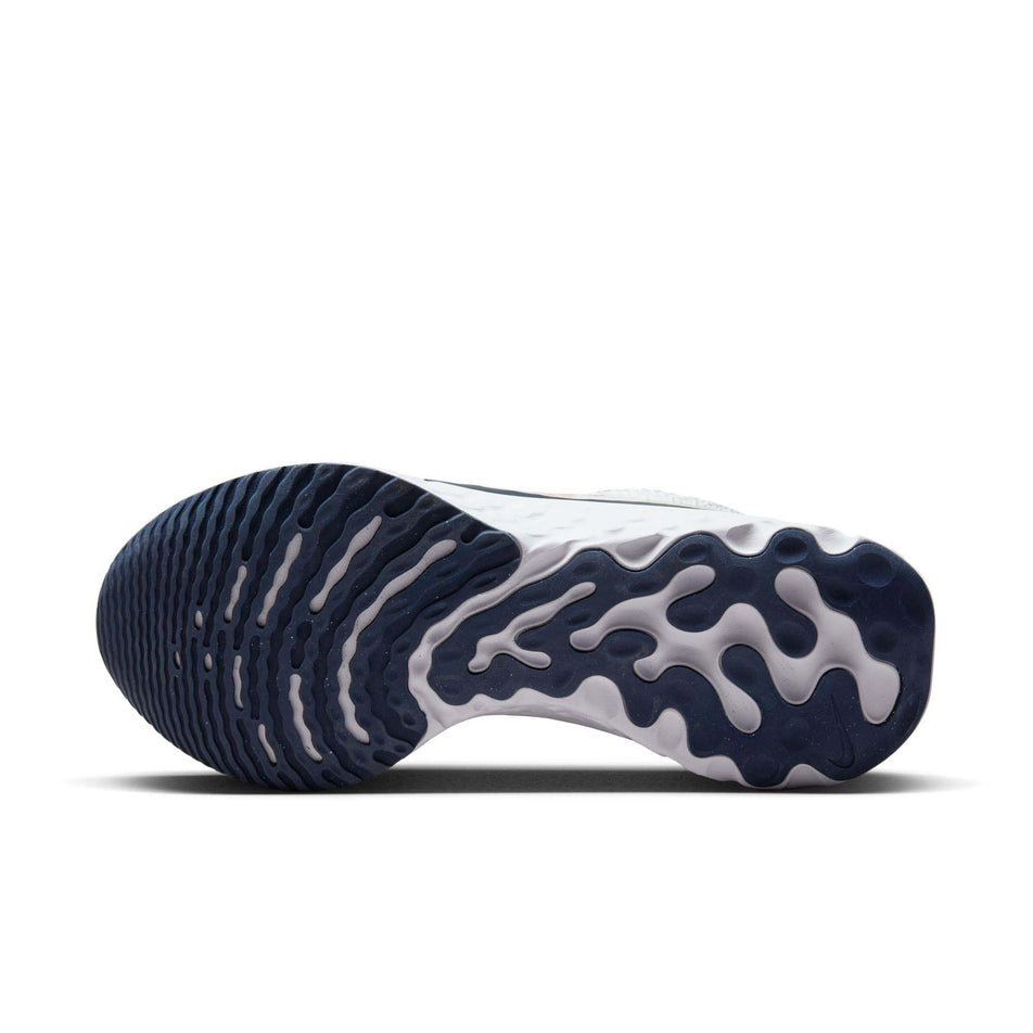 Outsole of the left shoe from a pair of Nike Women's React Infinity 3 Premium Road Running Shoes (7867350581410)
