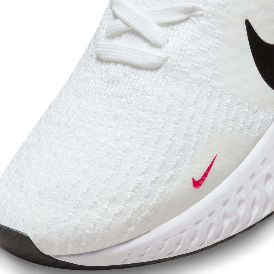 The toe box on the left shoe from a pair of Nike Men's React Infinity Run Flyknit 3 Road Running Shoes (7864313315490)