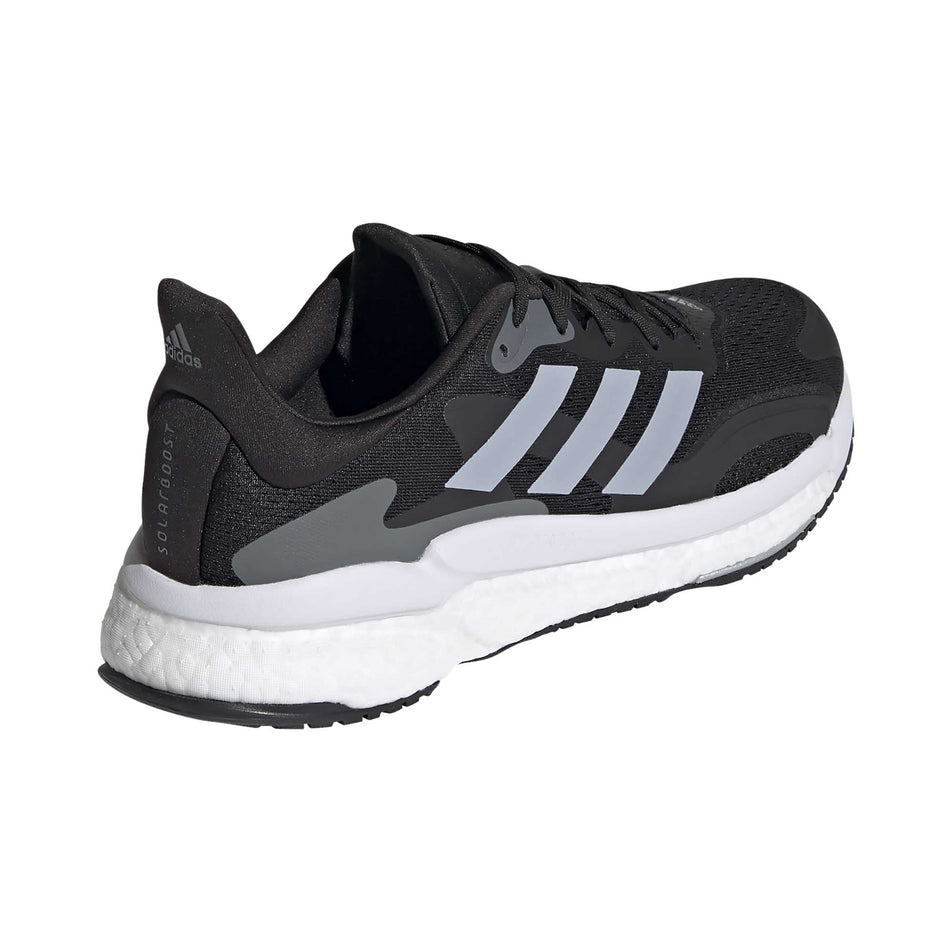The right shoe from a pair of men's adidas Solar Boost 3 (6893369131170)