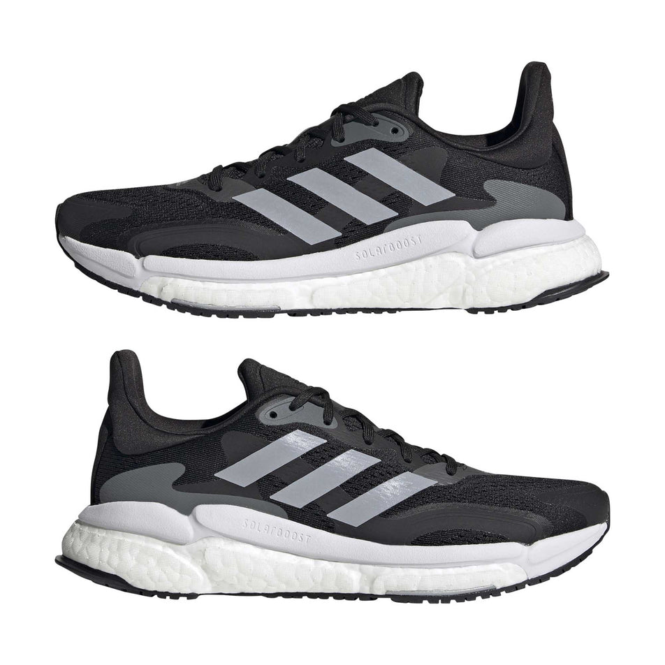 Lateral sides of the right and left shoes from a pair of women's adidas Solar Boost 3 (6893723287714)