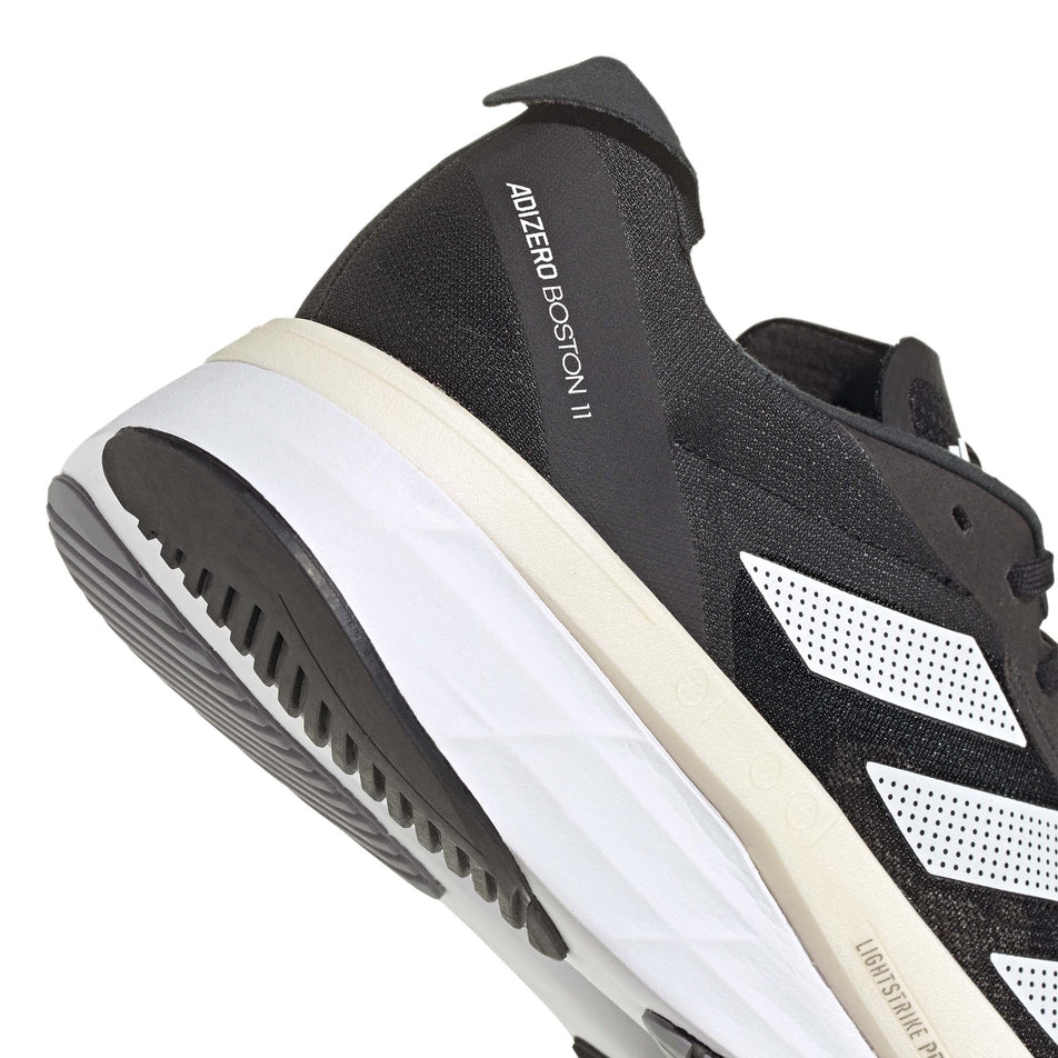 Midsole view of men's adidas adizero boston 11 running shoes in black (7510265299106)