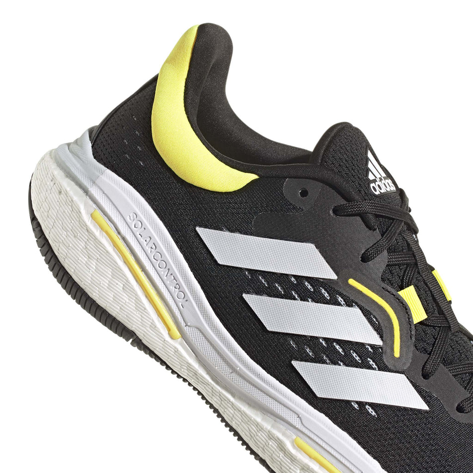Midsole view of men's adidas solar control running shoes in black (7510264348834)