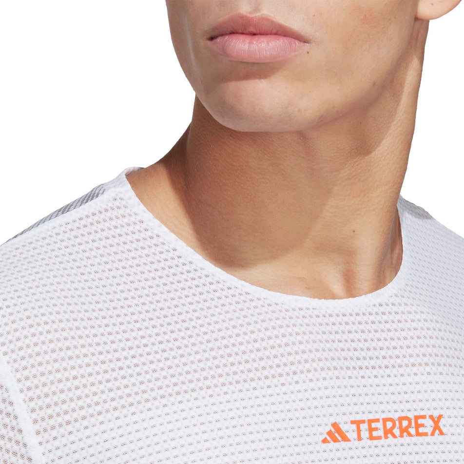 Close-up front view of a model wearing an adidas Men's Agravic Pro T-Shirt (7766904537250)