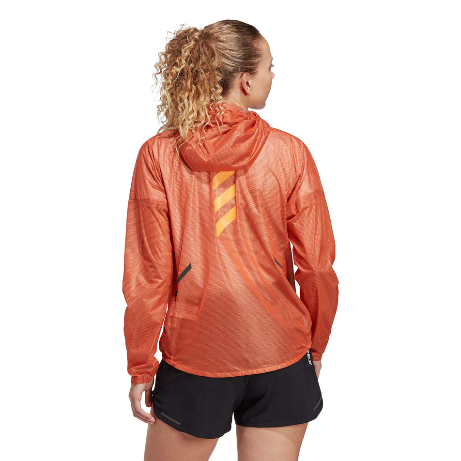 Back view of a model wearing an adidas Women's Terrex Agravic 2.5L Rain.RDY Jacket (7766901063842)
