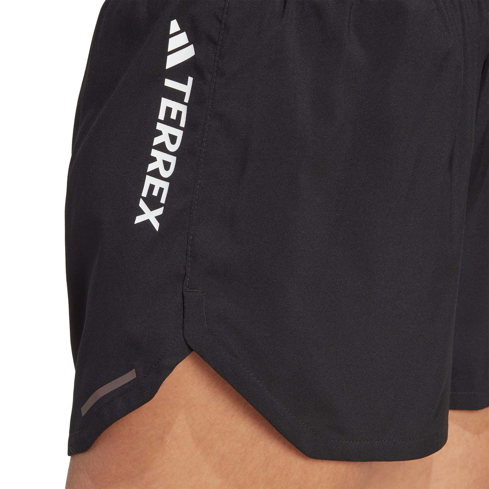 Close-up view of the Terrex logo on a pair of adidas Women's Agravic Shorts (7766876782754)
