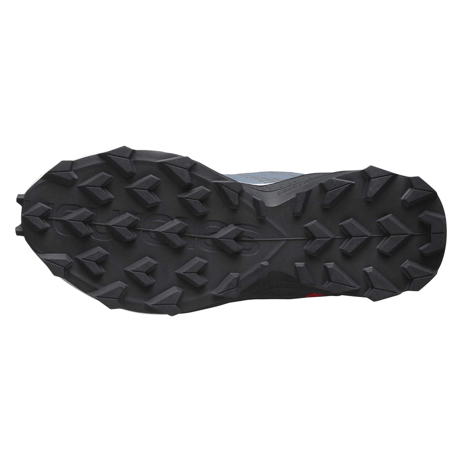 The full outsole on the left shoe from a pair of women's Salomon Supercross Blast (6899902644386)