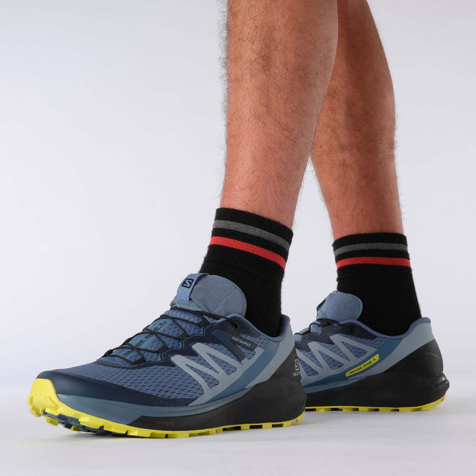 Lateral model view of men's salomon sense ride 4 running shoes (7536128983202)