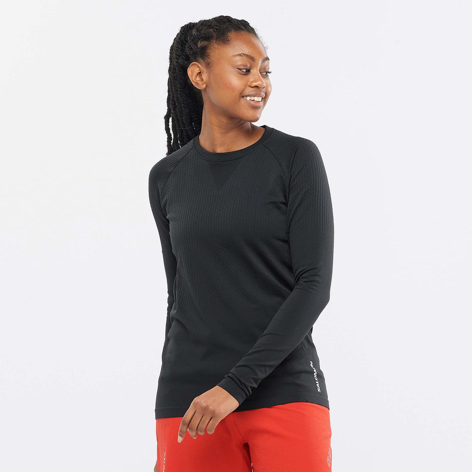 Front model view of women's salomon sense long sleeve tee in black (7564412256418)