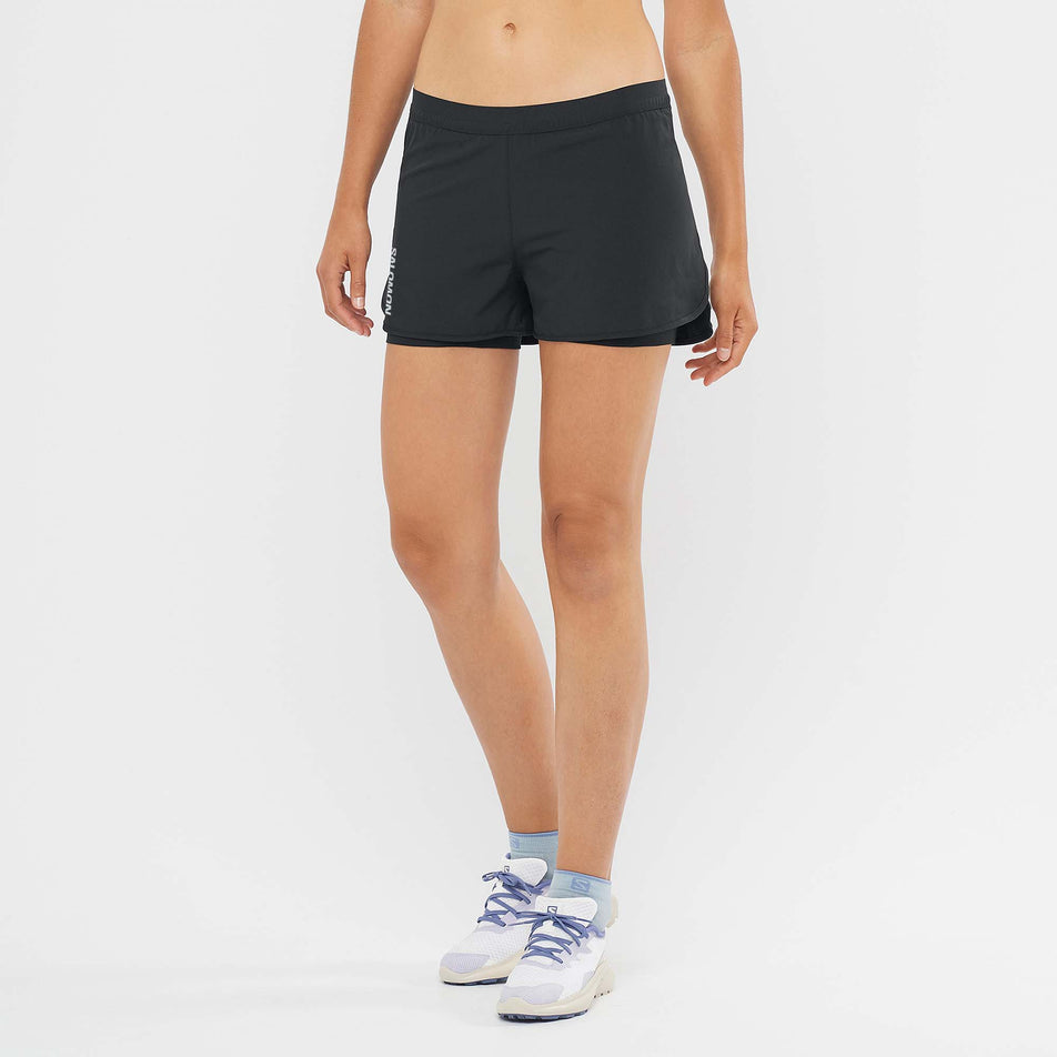 Front view of Salomon Women's Cross 2in1 Running Shorts in black. (7766865871010)