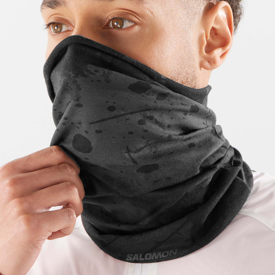 A male model wearing a Salomon Cross Neck Head Tube (7777495613602)