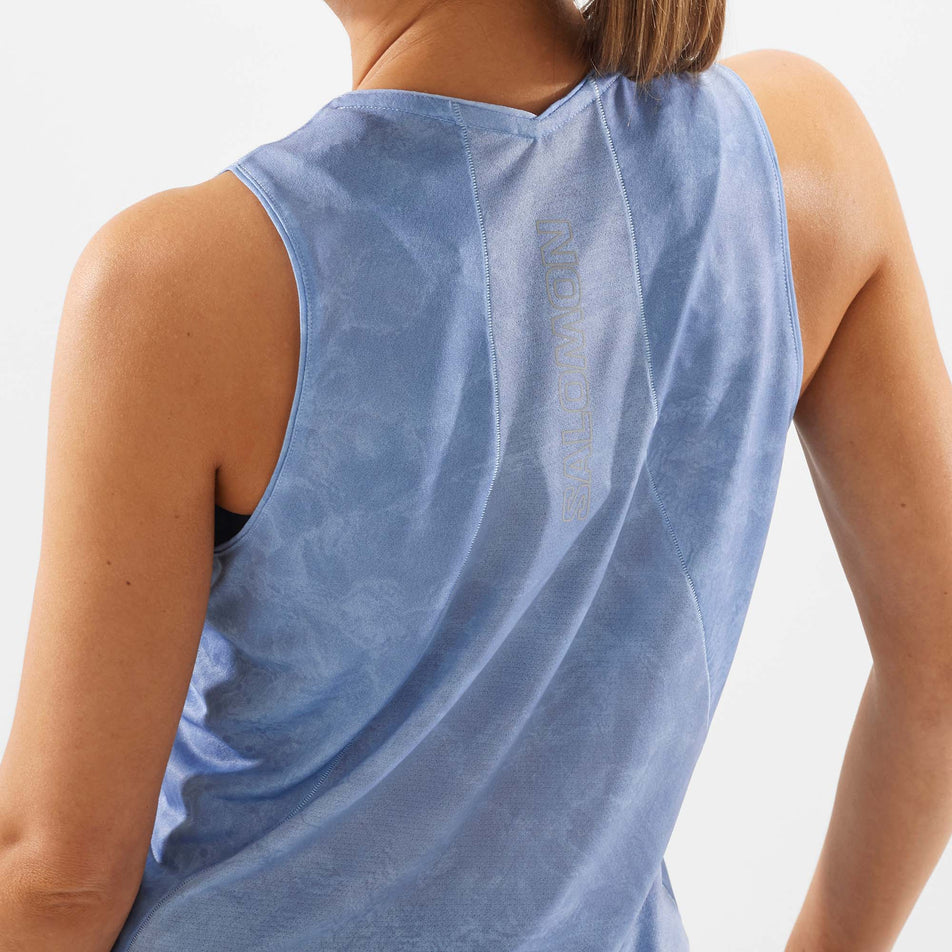 Close-up back view of a model wearing a Salomon Women's Sense Aero Tank in the Chambray Blue colourway (7892236697762)