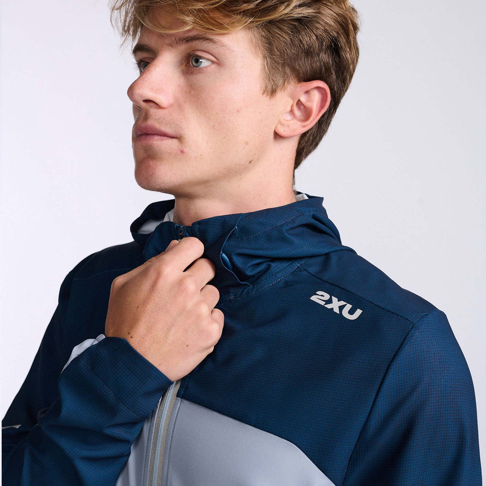 Close-up front view of the upper body section of a 2XU Men's Aero Jacket, being worn by a model (7778521153698)