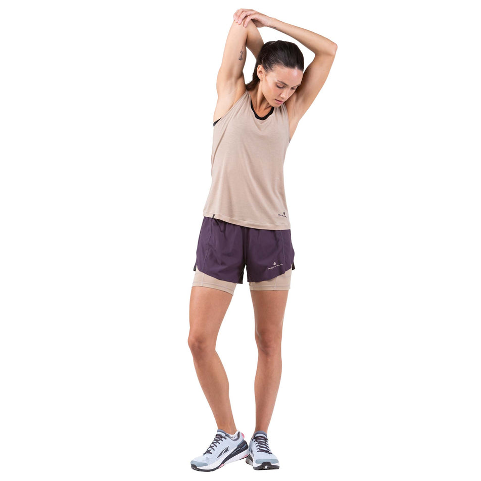 Front view of a model wearing a pair of the Women's Tech Ultra Twin Shorts in the Nightshade/Latte colourway (7739438006434)