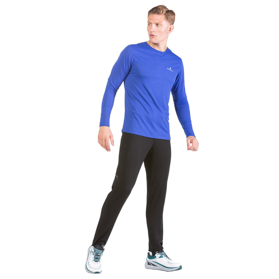 Front view of a model wearing a Ronhill Men's Core L/S Tee (7574440378530)
