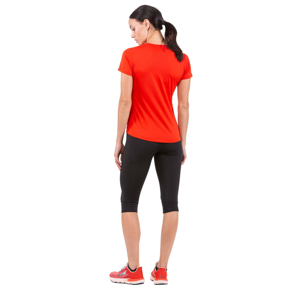 Back view of a model wearing a pair of Ronhill Women's Core Capri (6907728625826)