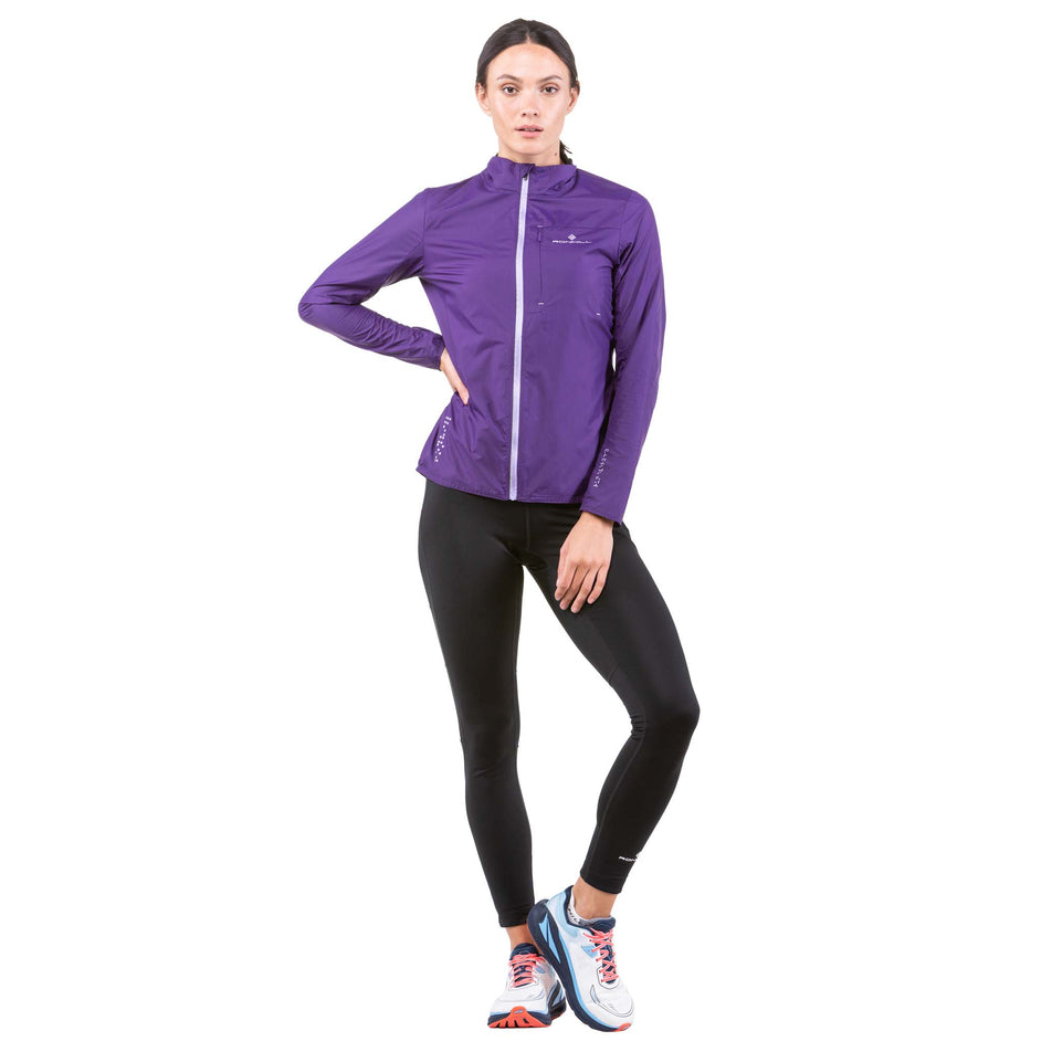 Front view of a model wearing a Ronhill Women's Tech LTW Jacket - fully zipped (7844276043938)