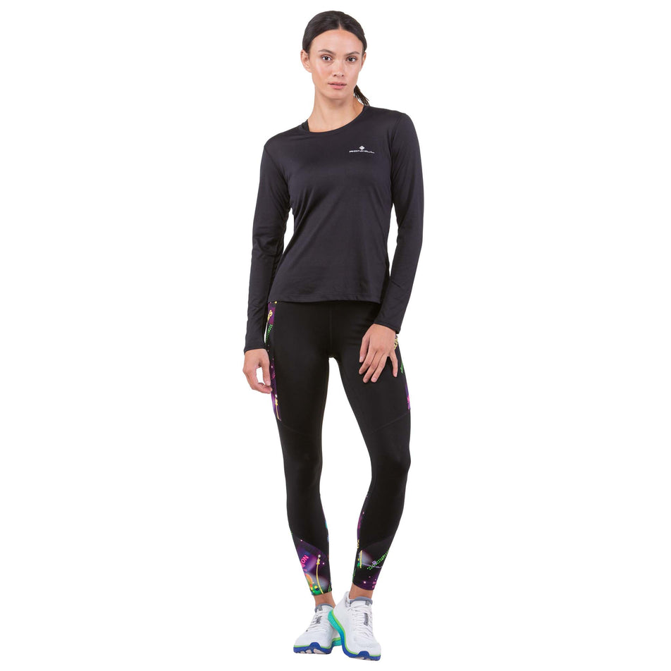 Front view of a model wearing a pair of Ronhill Women's Life Satori Tights (7745842675874)