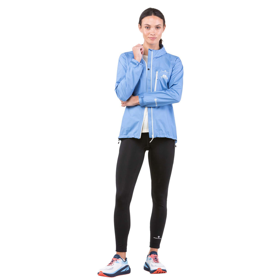 Front view of a model wearing a Ronhill Women's Tech Mercurial Jacket - jacket unzipped (7742604837026)