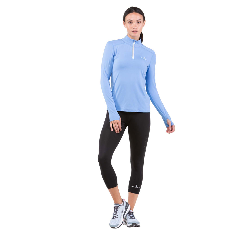 Front view of a model wearing a Ronhill Women's Life Practice 1/2 Zip Tee (7742592188578)